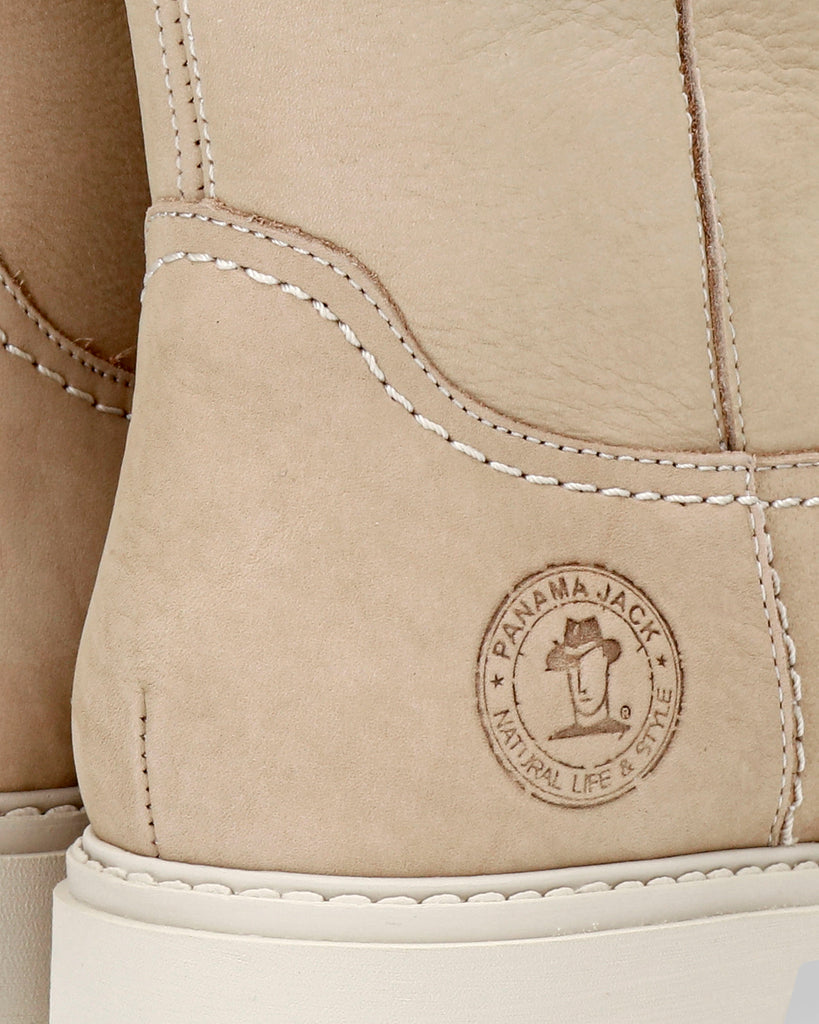 Bambina botas de piel con forro interior de pelo. crudo