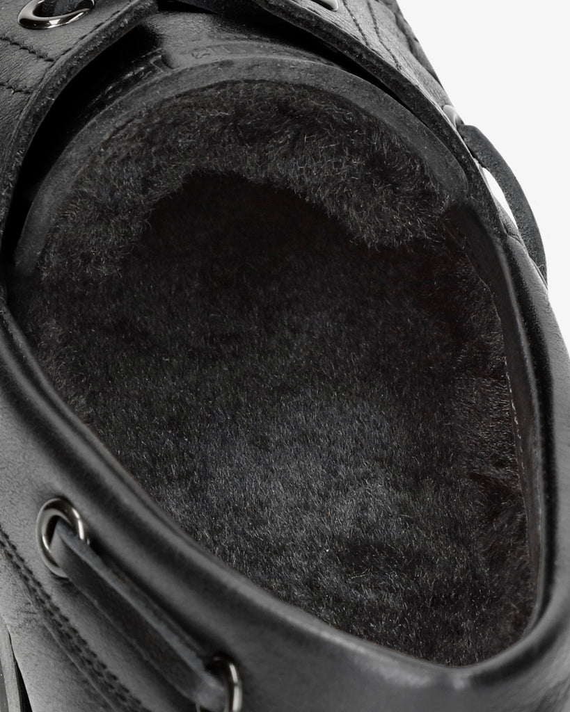 Boat Igloo náutico de piel con forro interior de pelo natural. negro