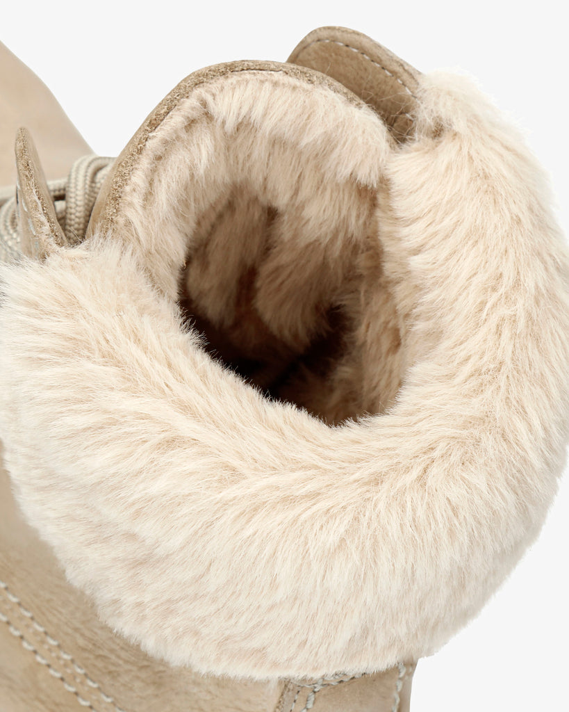 Felicia botas de piel con forro interior de pelo. crudo