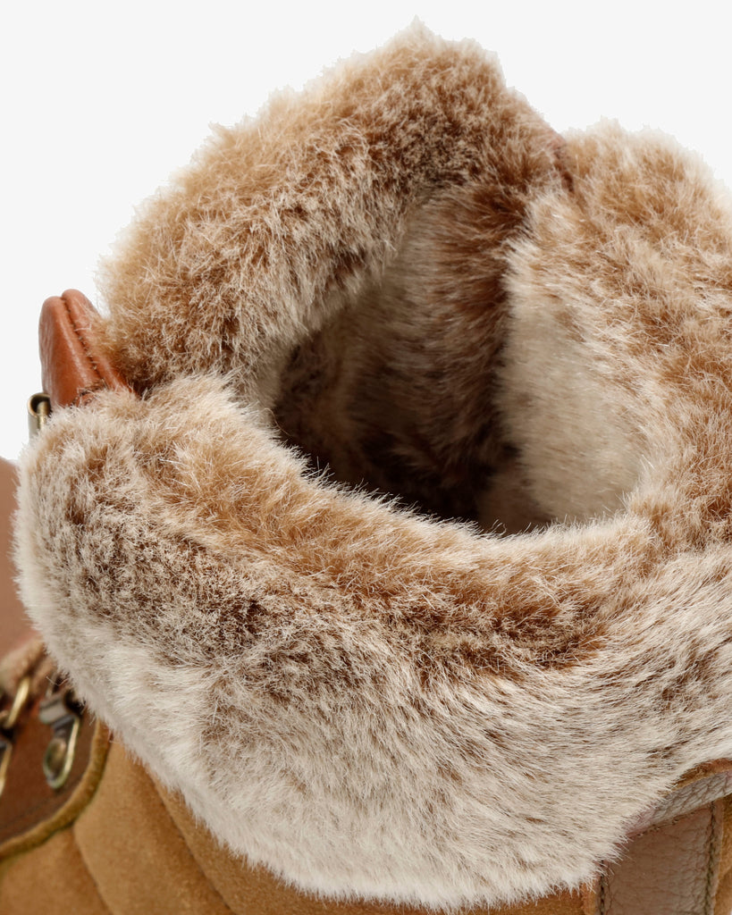 Tuscani botas de piel con forro interior de pelo. cuero